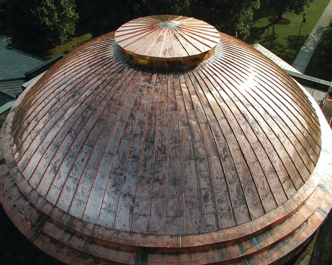 Craftsman Roofing crew installing a new roof in Camp Edwards